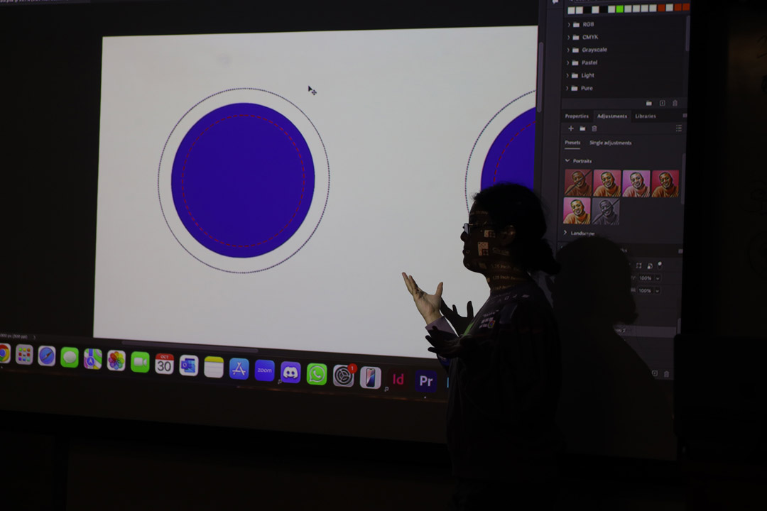The roof of a building with a glass structure and potted plants.