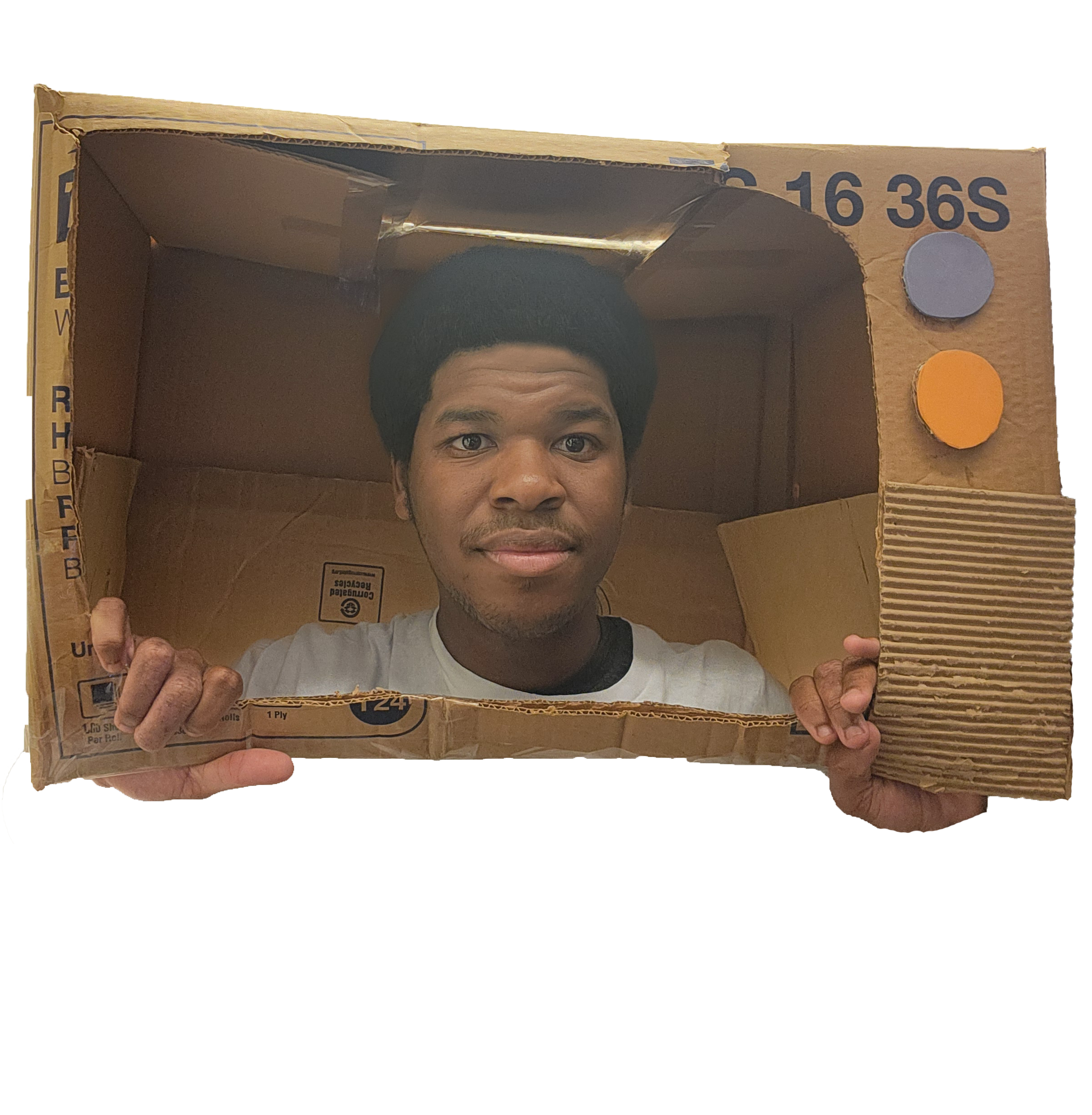 Man with short black hair wearing a white tee, posing in a cardboard TV, smiling.